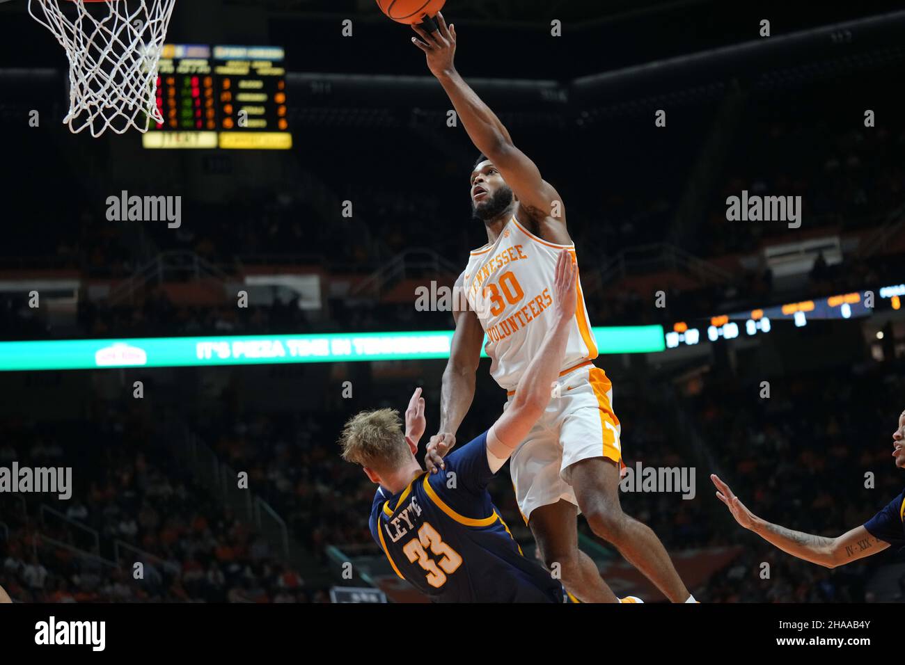 December 11, 2021: Josiah-Jordan James #30 of the Tennessee Volunteers shoots the ball over Bas Leyte #33 of the UNC-Greensboro Spartans during the NCAA basketball game between the University of Tennessee Volunteers and the University of North Carolina at Greensboro Spartans at Thompson-Boling Arena in Knoxville TN Tim Gangloff/CSM Stock Photo