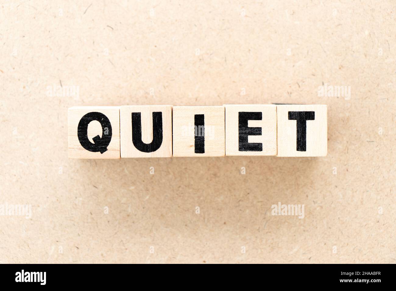 Alphabet letter block in word quiet on wood background Stock Photo Alamy
