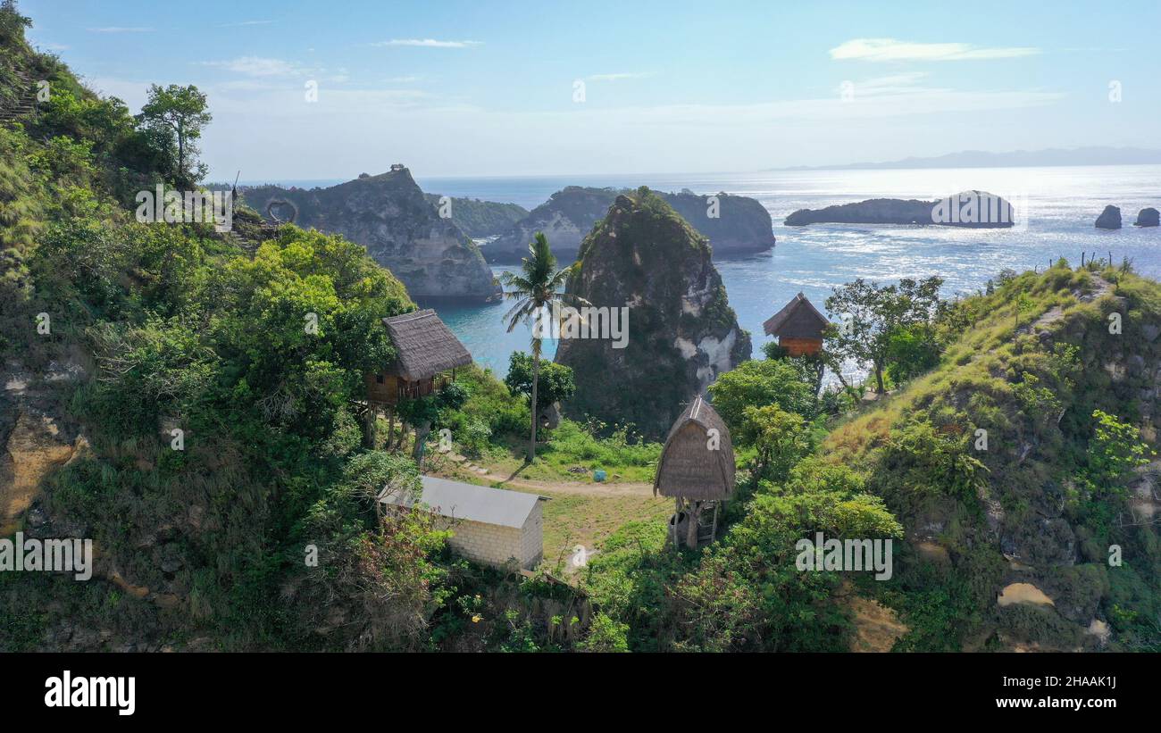 Aerial view of the small island of Nusa Batumategan from the Atuh Rija Lima shrine on Nusa Penida Island near Bali, Indonesia Stock Photo