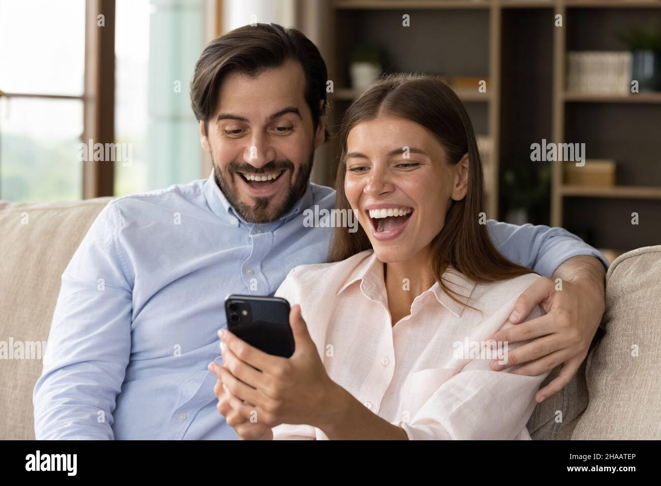 Excited young man woman hi-res stock photography and images - Alamy