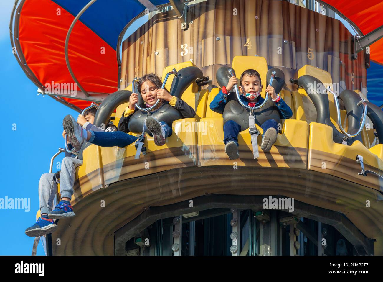 Ankara-Turkey:October 3, 2021: Children having fun at luna park | Genclik Parki in Ankara. People with high adneraline entertaining at amusement park. Stock Photo