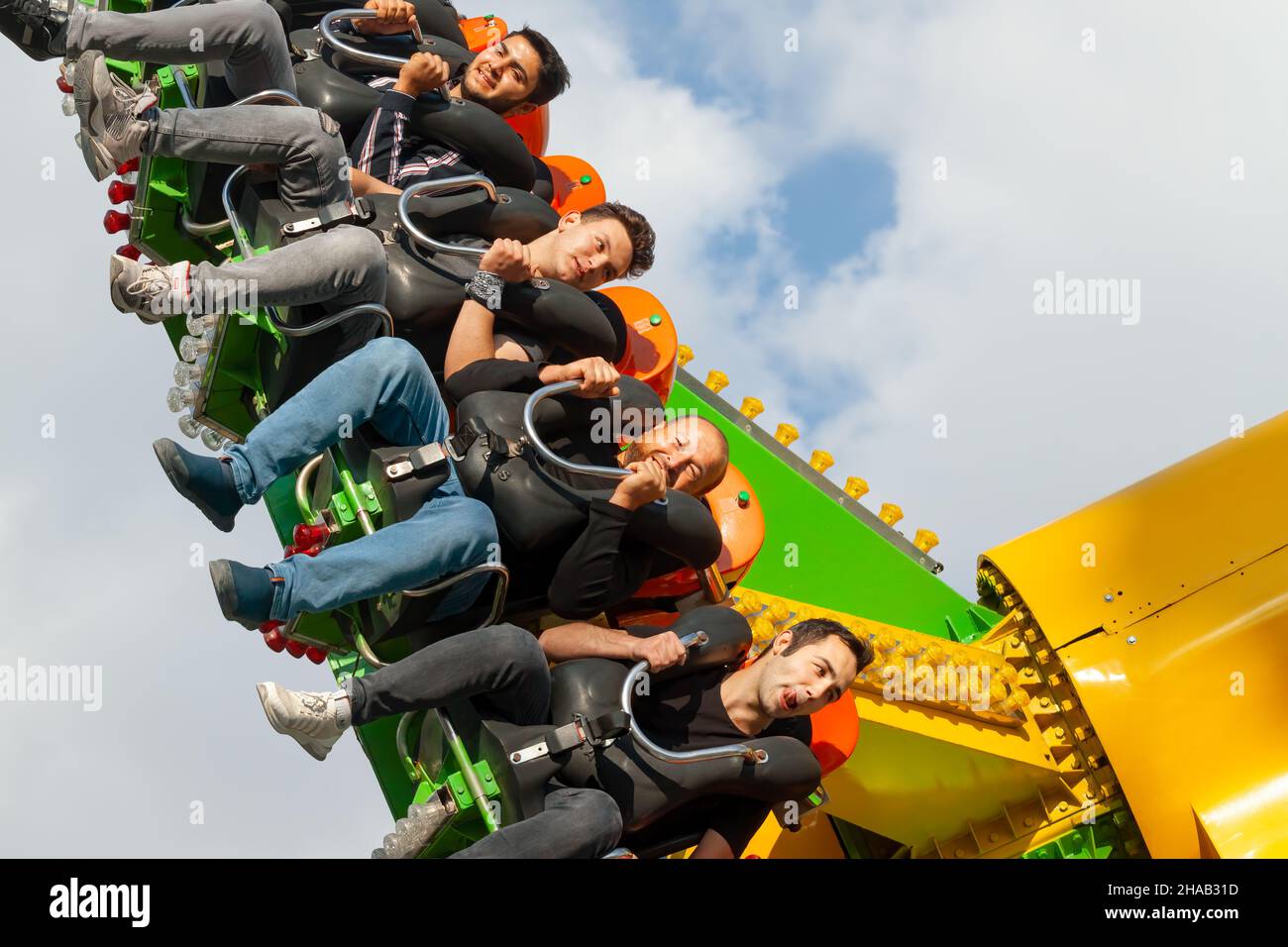 Ankara-Turkey:October 3, 2021: Group of cheerful and thrilled people having fun at Luna Park | Genclik Parki in Ankara. People with high adneraline en Stock Photo