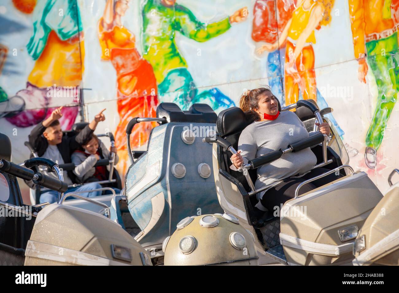 Ankara-Turkey:October 3, 2021: People having fun in monster ride at luna park | Genclik Parki in Ankara. People with high adneraline entertaining at a Stock Photo