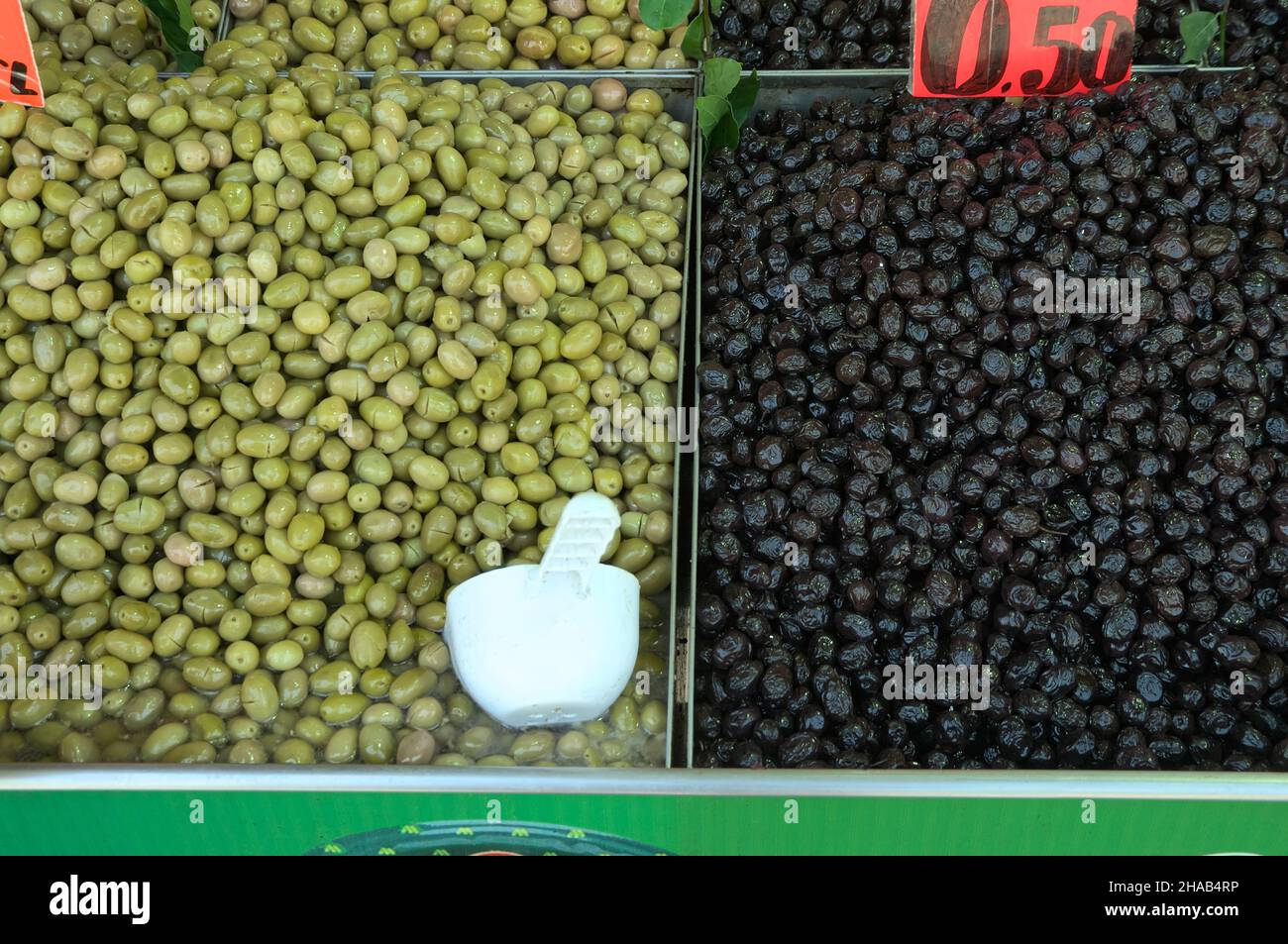 economy and tourism in Turkey green and black olives a mediterranean food in Istanbul's Grand Bazaar Stock Photo