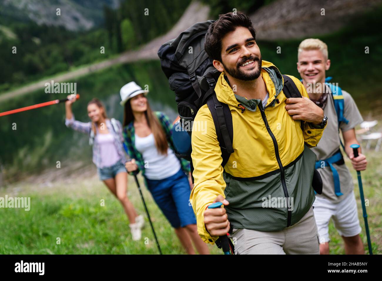 Hiking friends travel outdoor group sport lifestyle concept Stock Photo