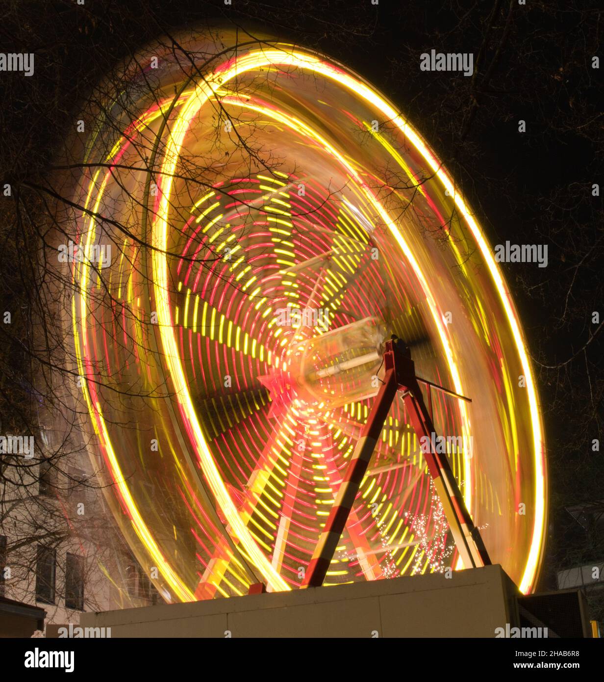 Long exposure of a children's carousel at the Paderborn Christmas market Stock Photo