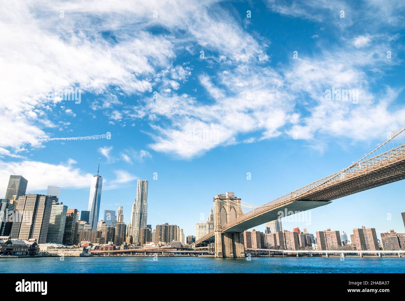 New York Skyline and Brooklyn Bridge Stock Photo