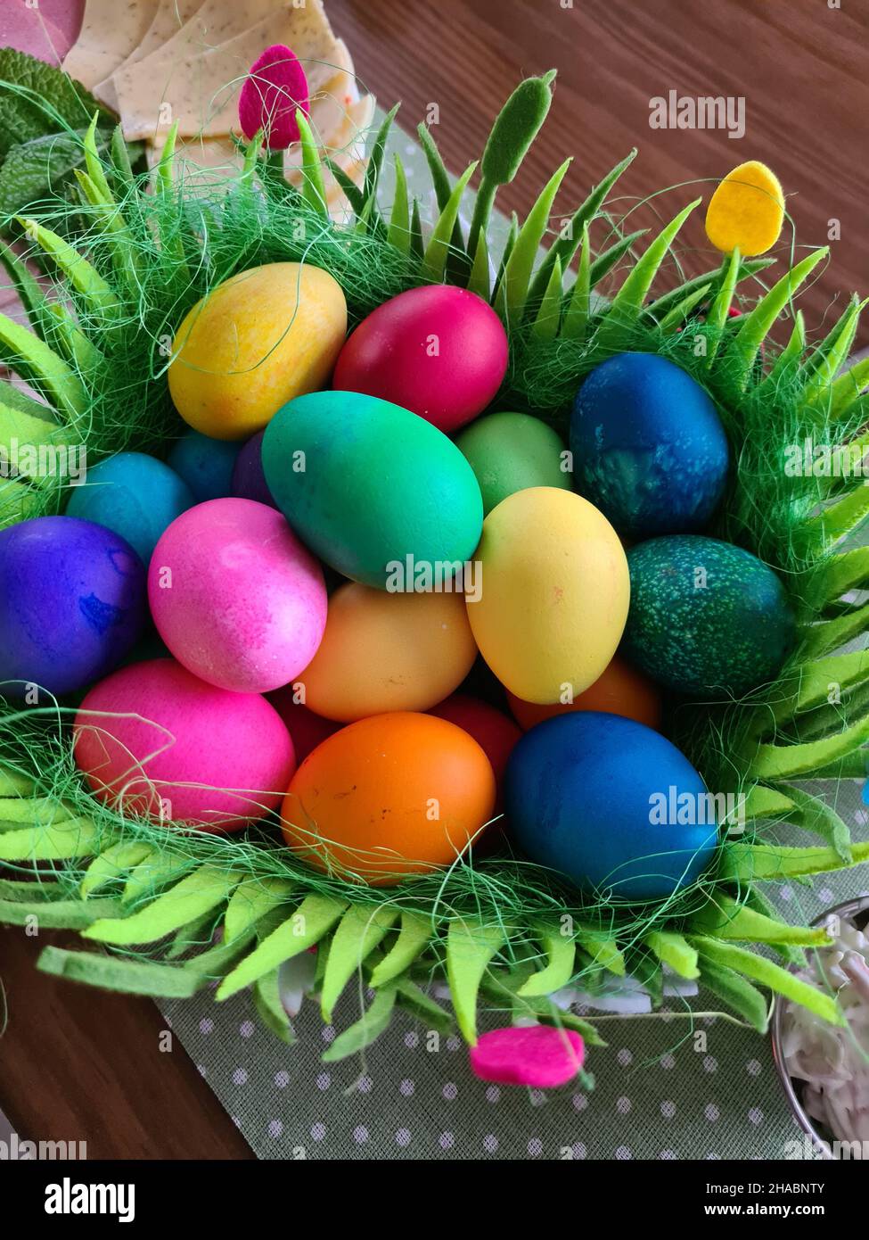 Happy Easter, Easter nest with colorful Easter eggs and heart Stock Photo
