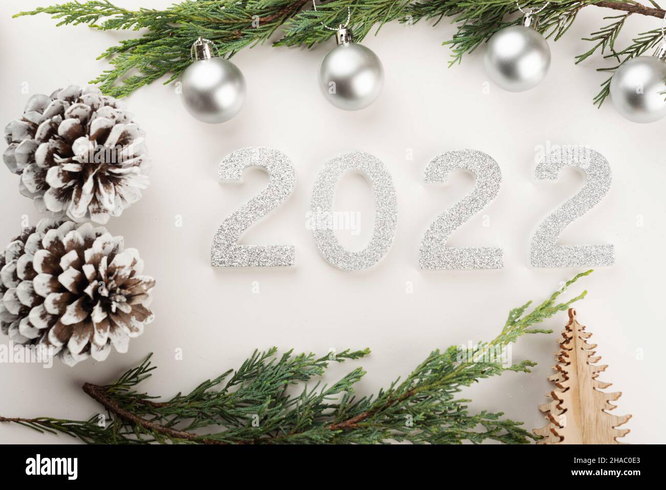 Christmas 2022 New Year Greeting. Turquoise Blue Ball Bauble, Gold Text Merry Christmas Happy New Year Over Dark Blue Reflection. Business Corporate C Stock Photo - Alamy
