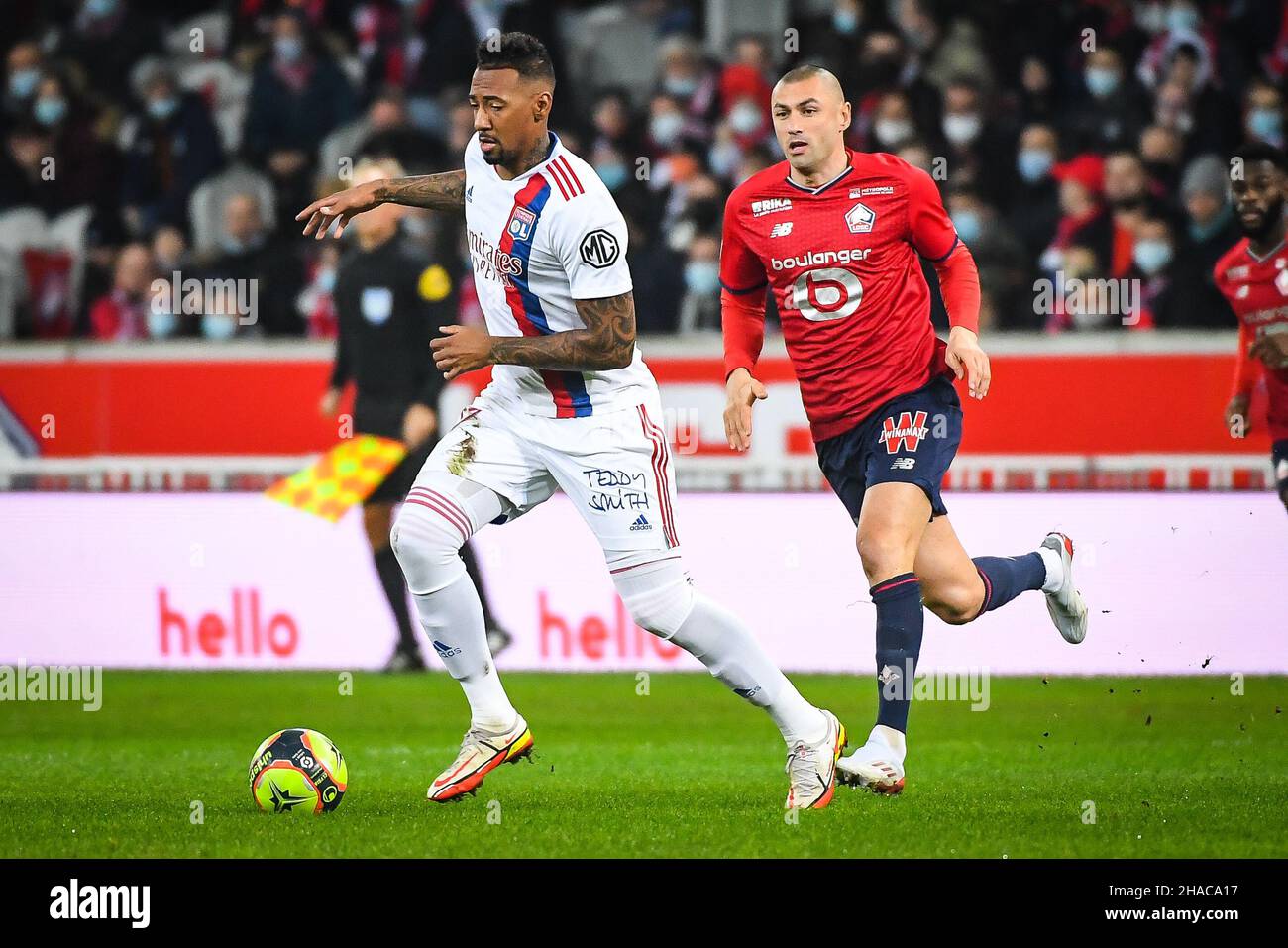 Jerome BOATENG of Lyon and Burak YILMAZ of Lille during the French championship Ligue 1 football match between LOSC Lille and Olympique Lyonnais (Lyon) on December 12, 2021 at Pierre Mauroy stadium in Villeneuve-d'Ascq near Lille, France - Photo: Matthieu Mirville/DPPI/LiveMedia Stock Photo