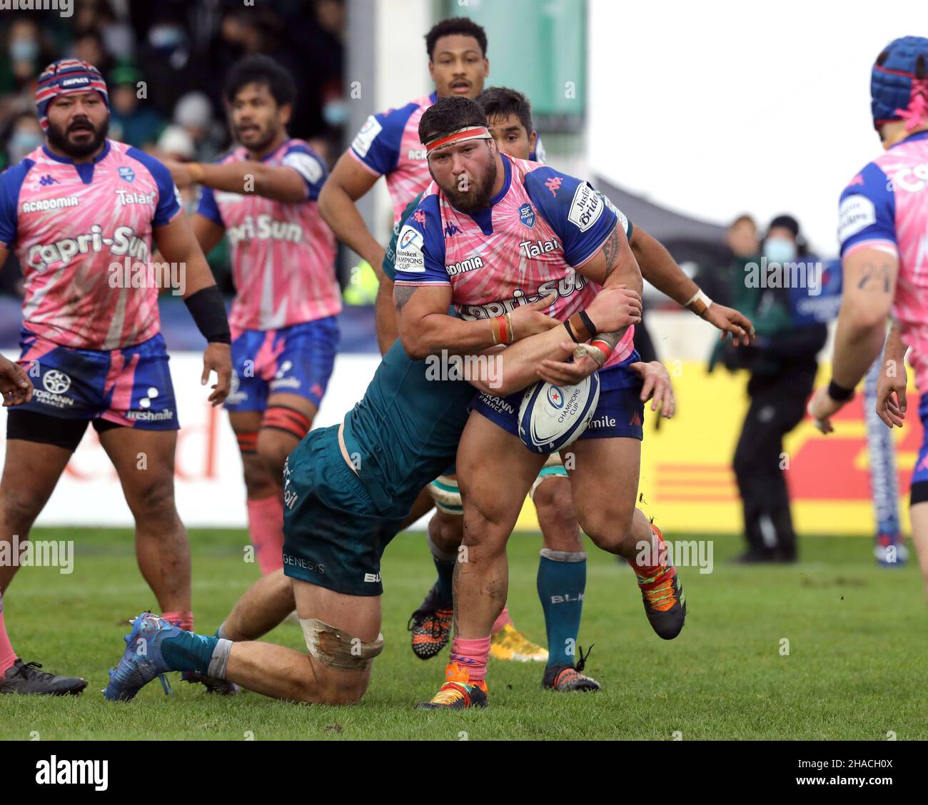 Stade Francais' Nemo Roelofse tackled by Connacht's Cian Prendergast during the Heineken Champions Cup Pool B match at The Galway Sportsgrounds in Galway, Ireland. Picture date: Sunday December 12, 2021. Stock Photo