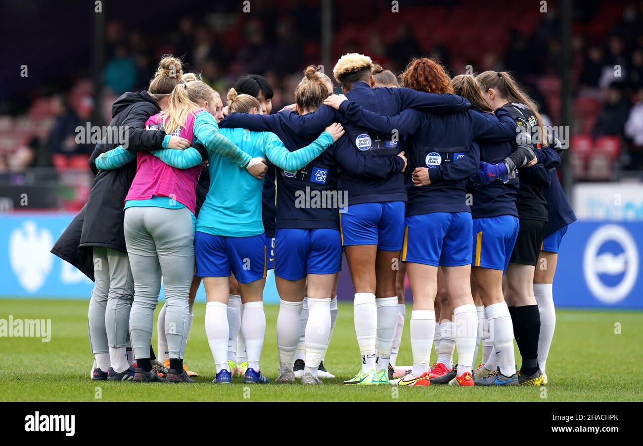 Brighton and Hove Albion team huddle prior to the Barclays FA Women's Super League match at The People's Pension Stadium, Brighton. Picture date: Sunday December 12, 2021. Stock Photo