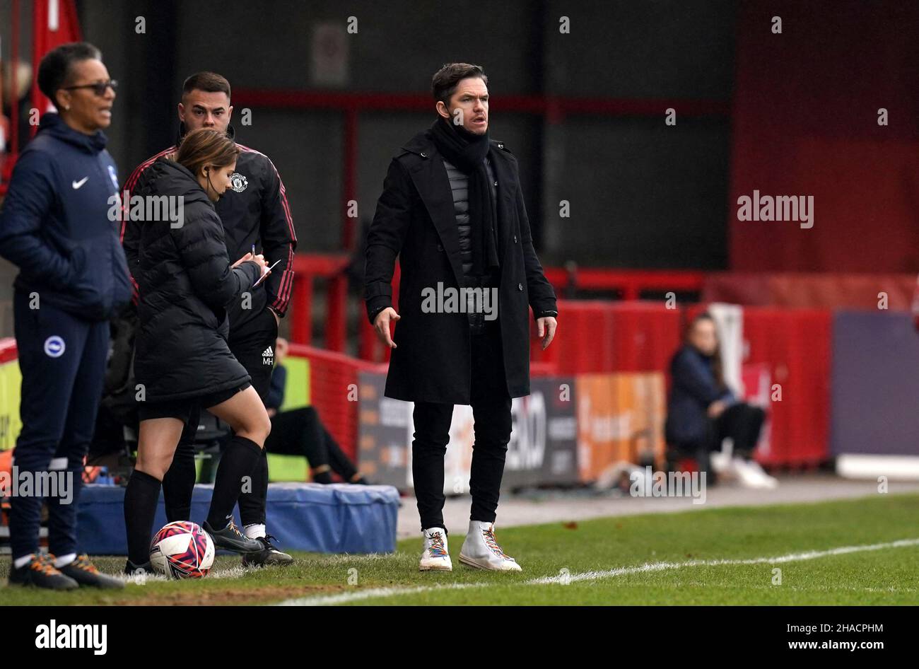 Manchester United manager Marc Skinner on the touchline during the Barclays FA Women's Super League match at The People's Pension Stadium, Brighton. Picture date: Sunday December 12, 2021. Stock Photo