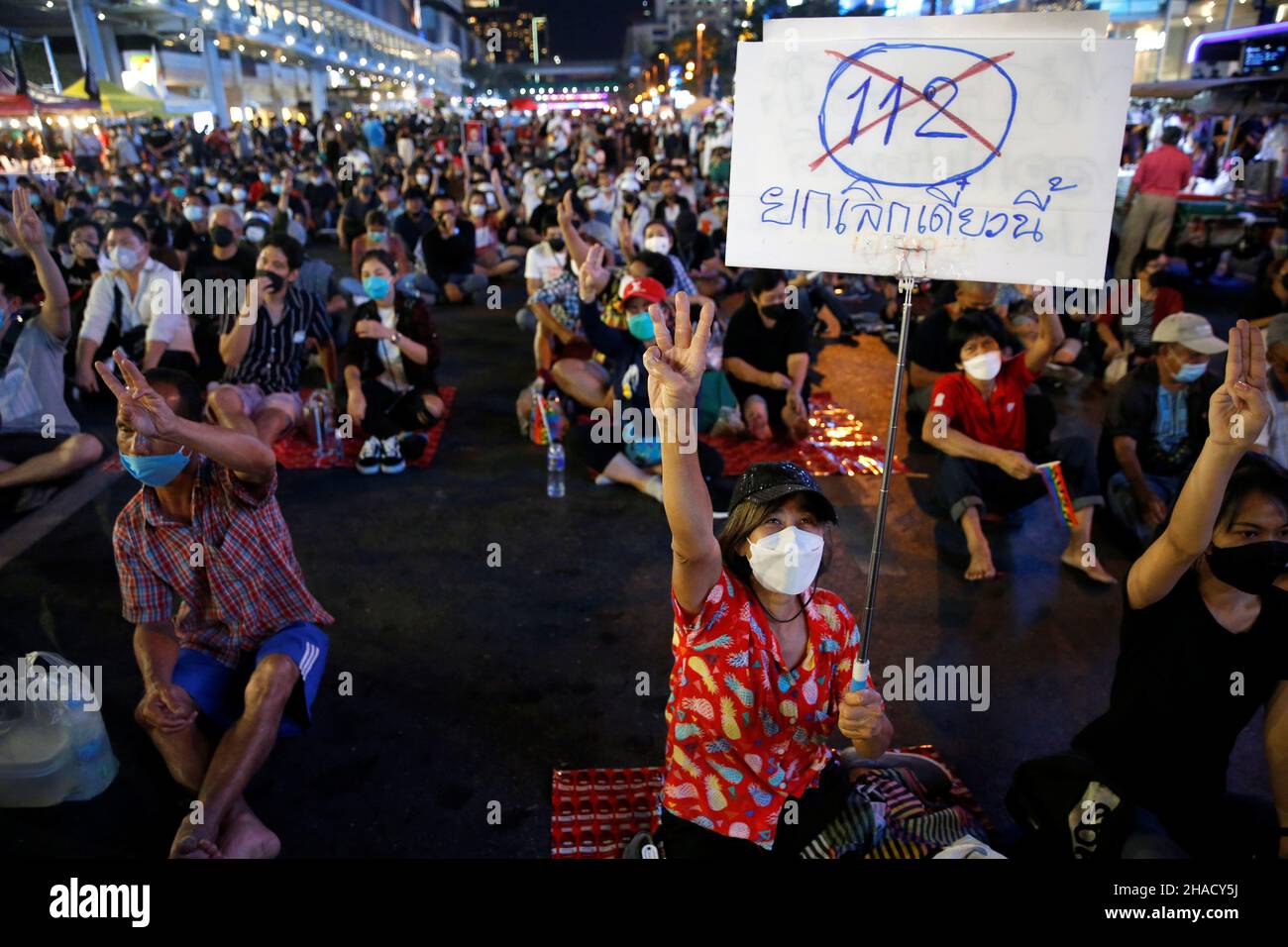 People attend a protest against Thailand's lese majeste law, in Bangkok, Thailand December 12, 2021. REUTERS/Soe Zeya Tun Stock Photo