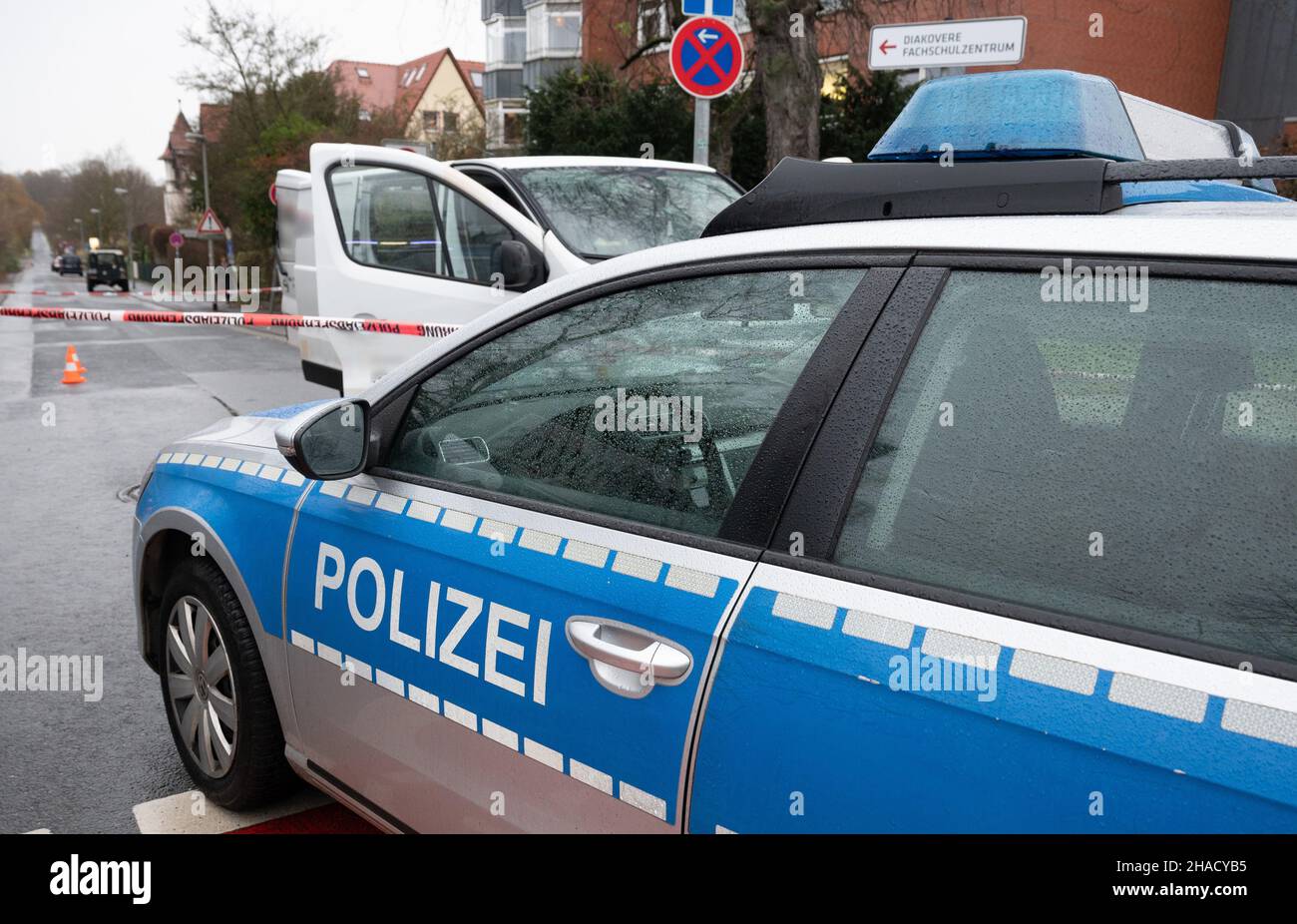 Hanover, Germany. 12th Dec, 2021. A van stopped by police stands at an ...
