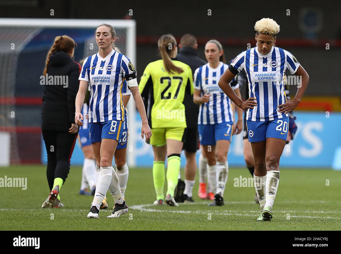 Crawley, UK. 12th Dec, 2021. Megan Connolly (L) and Victoria Williams of Brighton and Hove Albion look dejected after the The FA Women's Super League match at The People's Pension Stadium, Crawley. Picture credit should read: Paul Terry/Sportimage Credit: Sportimage/Alamy Live News Stock Photo