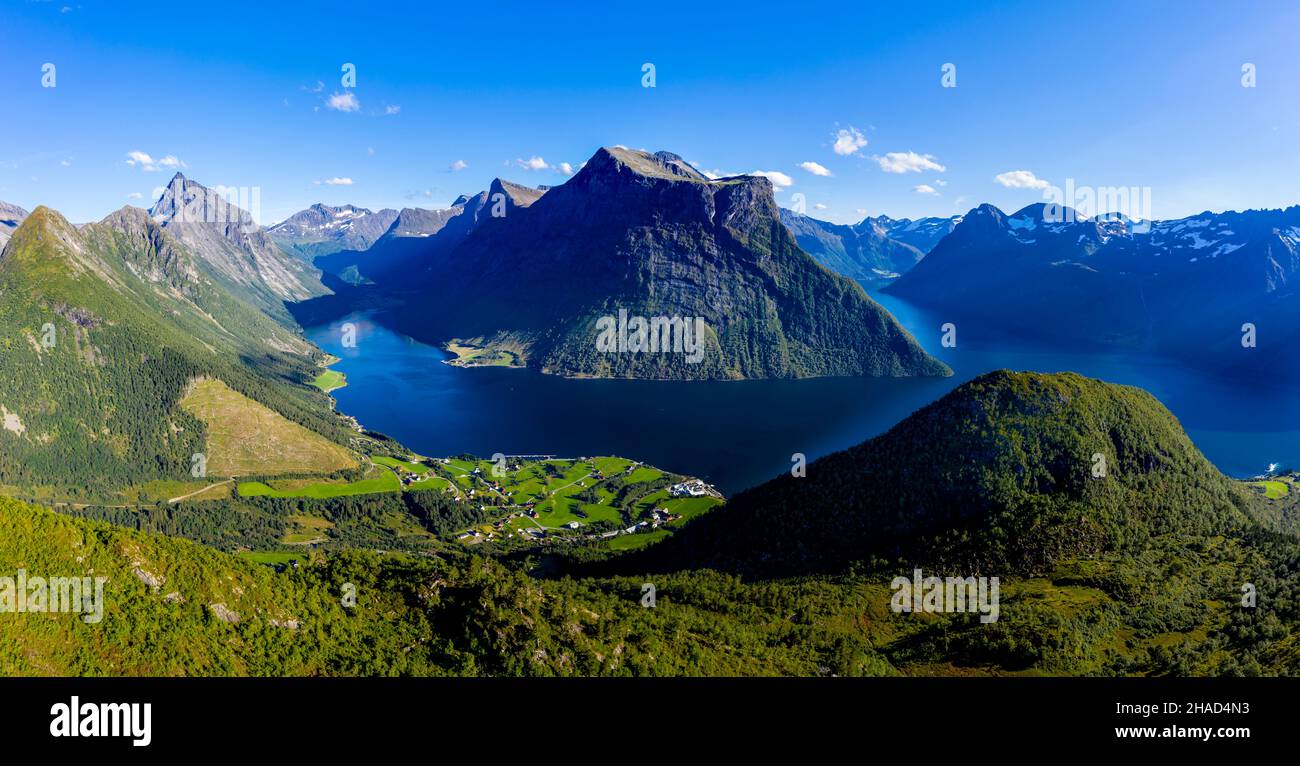 Panoramic aerial view of the inner Hjoerundfjord at village Urke, Mt. Slogen in the back, Norway Stock Photo