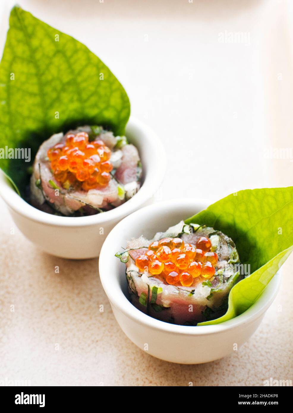 Spicy tuna tartar with lime juice, chili and roasted rice, a healthy