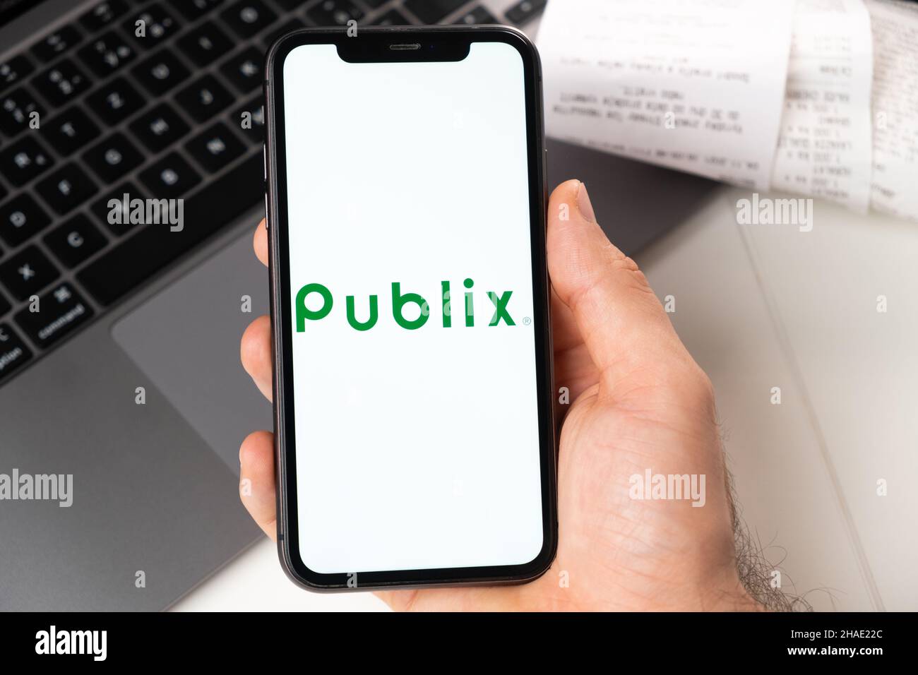 Publix mobile application of the supermarket chain in a smartphone. Online purchase with a laptop and a smartphone. November 2021, San Francisco, USA Stock Photo