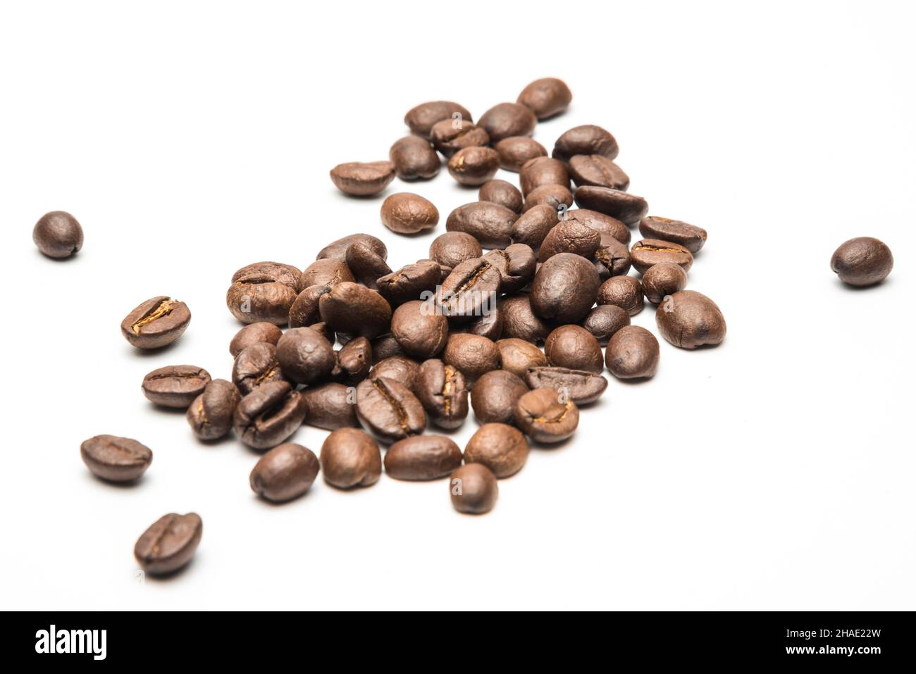 coffee beans roasted on a white background with copy space for your ...
