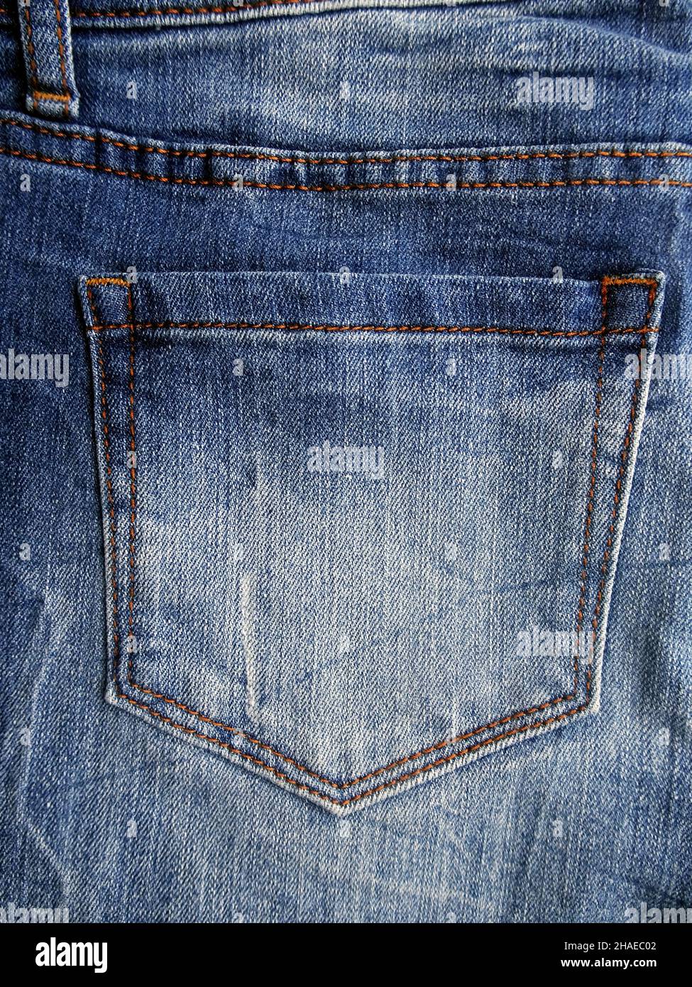 Background of worn jeans pocket Stock Photo