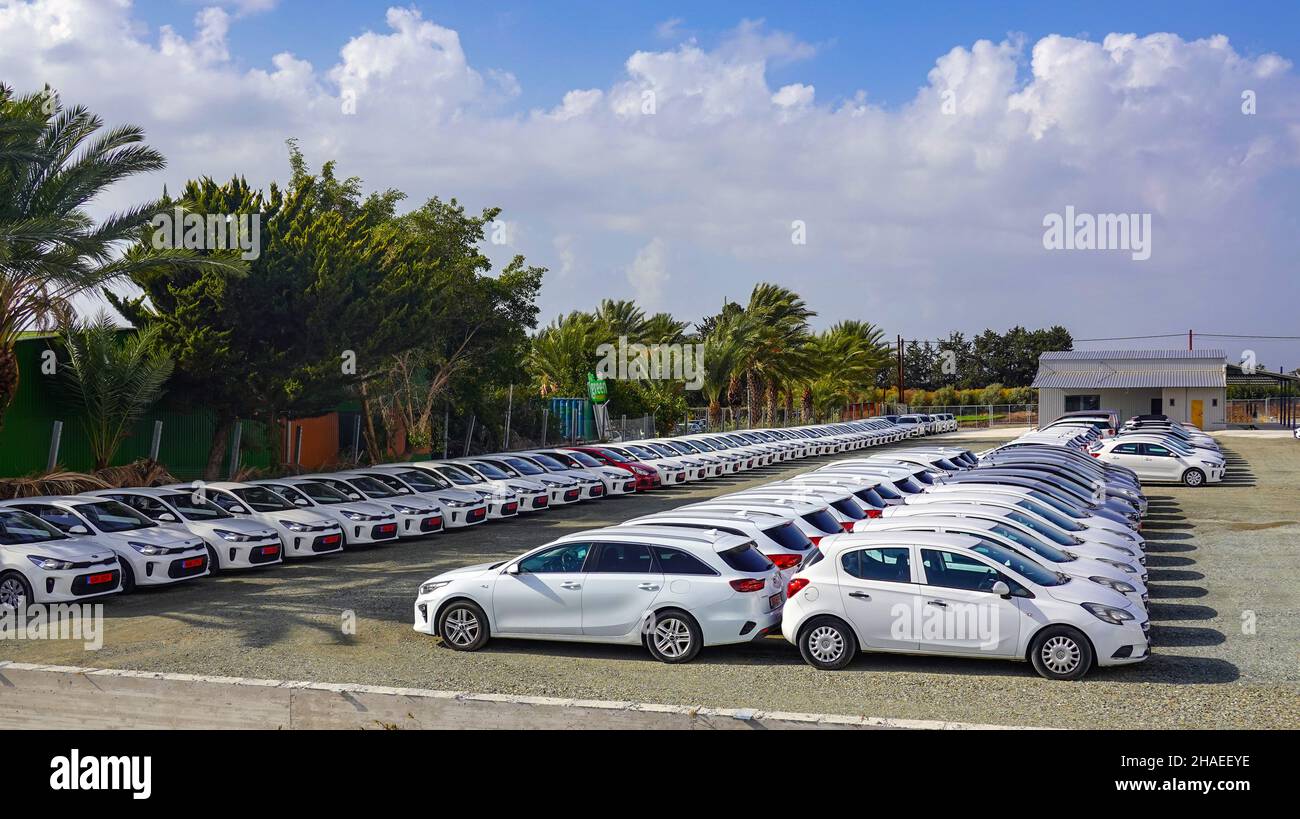 White hire cars parked near Paphos airport, Pafos, Cyprus