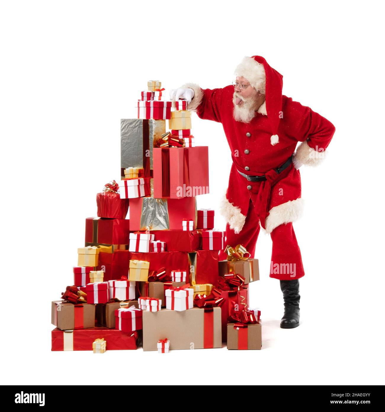 Santa Claus putting heap pile of gifts isolated on white background ...