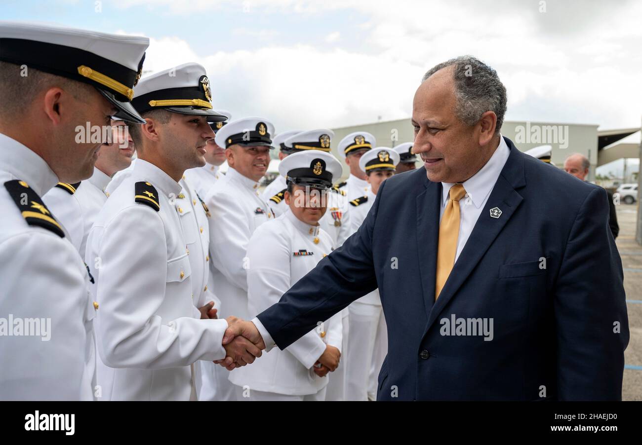 Pearl Harbor, United States. 08 December, 2021. U.S. Secretary of the Navy Carlos Del Toro, greets sailors assigned to the newest guided-missile destroyer, USS Daniel Inouye during the commissioning ceremony at Joint Base Pearl Harbor-Hickam, December 8, 2021 in Honolulu, Hawaii. The warship honors former U.S. Senator and Medal of Honor recipient Daniel Inouye. Credit: MC2 Logan Keown/U.S. Navy/Alamy Live News Stock Photo