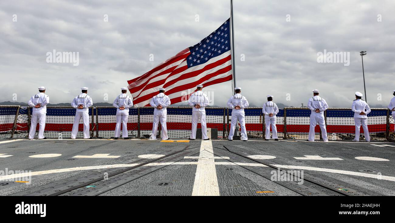 Pearl Harbor, United States. 08 December, 2021. U.S. Navy sailors man the rails during the commissioning ceremony for the newest guided-missile destroyer, USS Daniel Inouye at Joint Base Pearl Harbor-Hickam, December 8, 2021 in Honolulu, Hawaii. The warship honors former U.S. Senator and Medal of Honor recipient Daniel Inouye. Credit: MC1 Sean P. La Marr/U.S. Navy/Alamy Live News Stock Photo