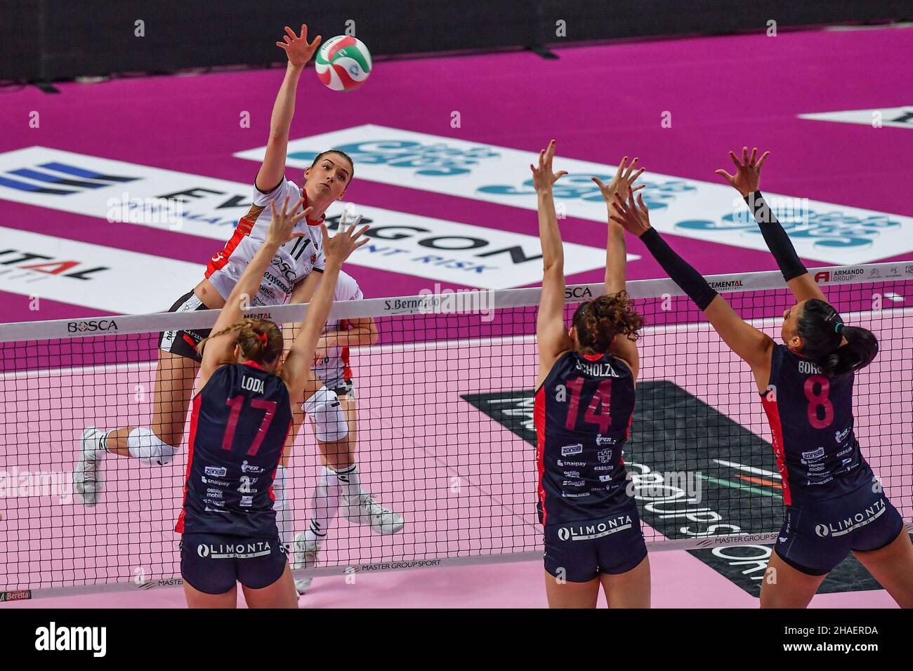 Cuneo, Italy. 12th Dec, 2021. Loda Sara (Bergamo), Gicquel Lucille (Bosca Cuneo), Schoelzel Marie (Bergamo), Borgo Ana Paula (Bergamo) during Bosca S.Bernardo Cuneo vs Volley Bergamo 1991, Volleyball Italian Serie A1 Women match in Cuneo, Italy, December 12 2021 Credit: Independent Photo Agency/Alamy Live News Stock Photo