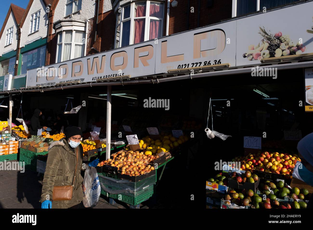Foodworld shop along the Stratford Road in Sparkhill, an inner-city area of Birmingham situated between Springfield, Hall Green and Sparkbrook on 25th November 2021 in Birmingham, United Kingdom. The Sparkhill has become heavily influenced by migrants who settled here over many decades. It has a large population of ethnic minorities, mainly of South Asian origin, which is reflected by the number of Asian eateries in the area. As a result, Sparkhill has become a main centre in the Balti Triangle of Birmingham. Stock Photo