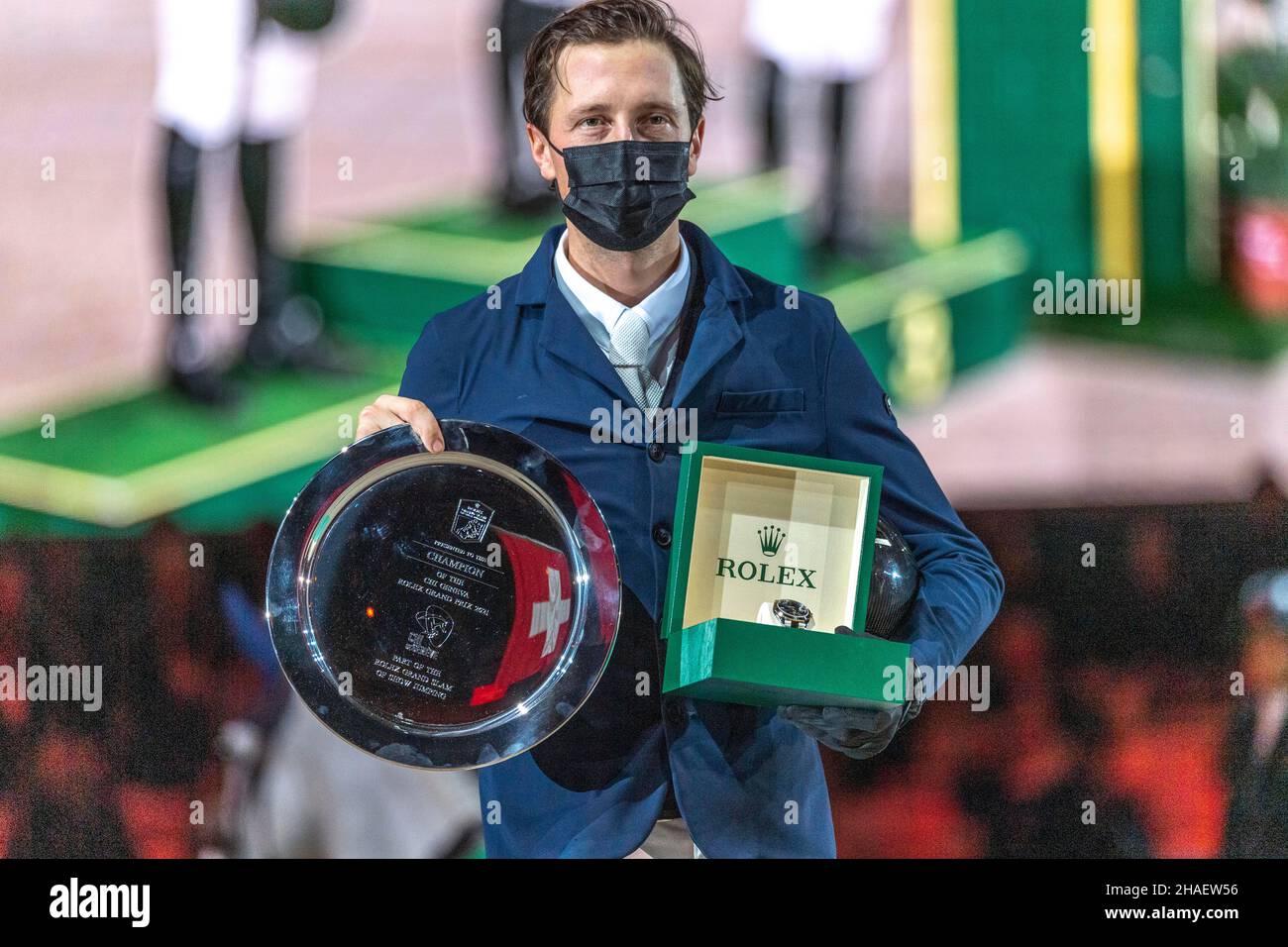 Geneva, Switzerland. 12th Dec, 2021. Martin Fuchs of Switzerland wins the Rolex Grand Slam of Show Jumping tournament 2021 and receives a Rolex watch and a trophy. (Credit Image: © Eric Dubost/Pacific Press via ZUMA Press Wire) Stock Photo