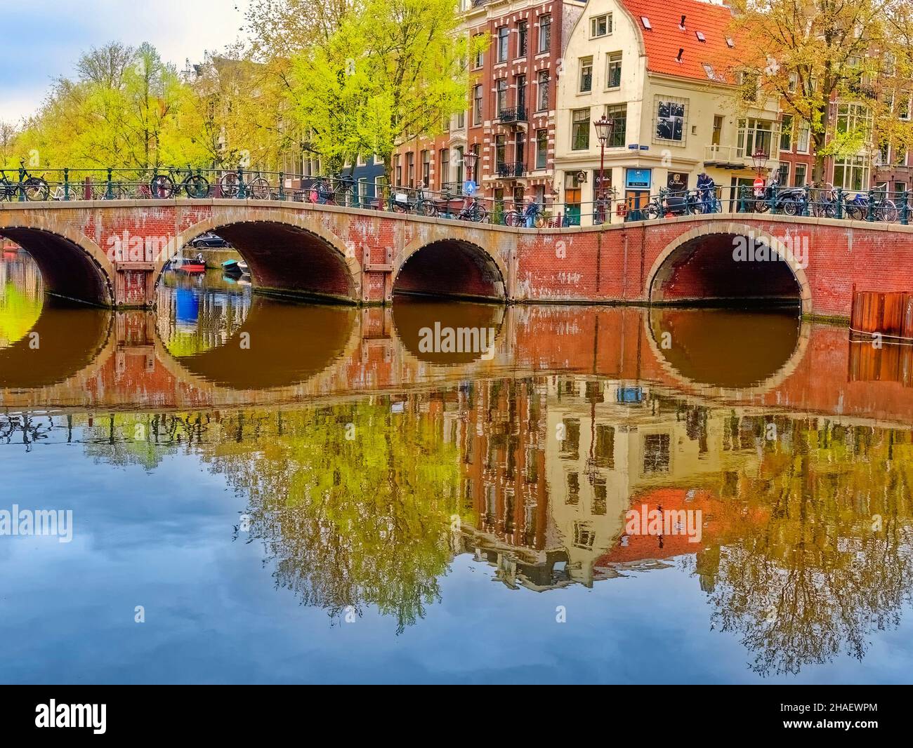 canal, house, amsterdam, holland, city, travel, netherlands, architecture, bridge, building, europe, river, tree, skyline, window, bicycle, dutch, urb Stock Photo