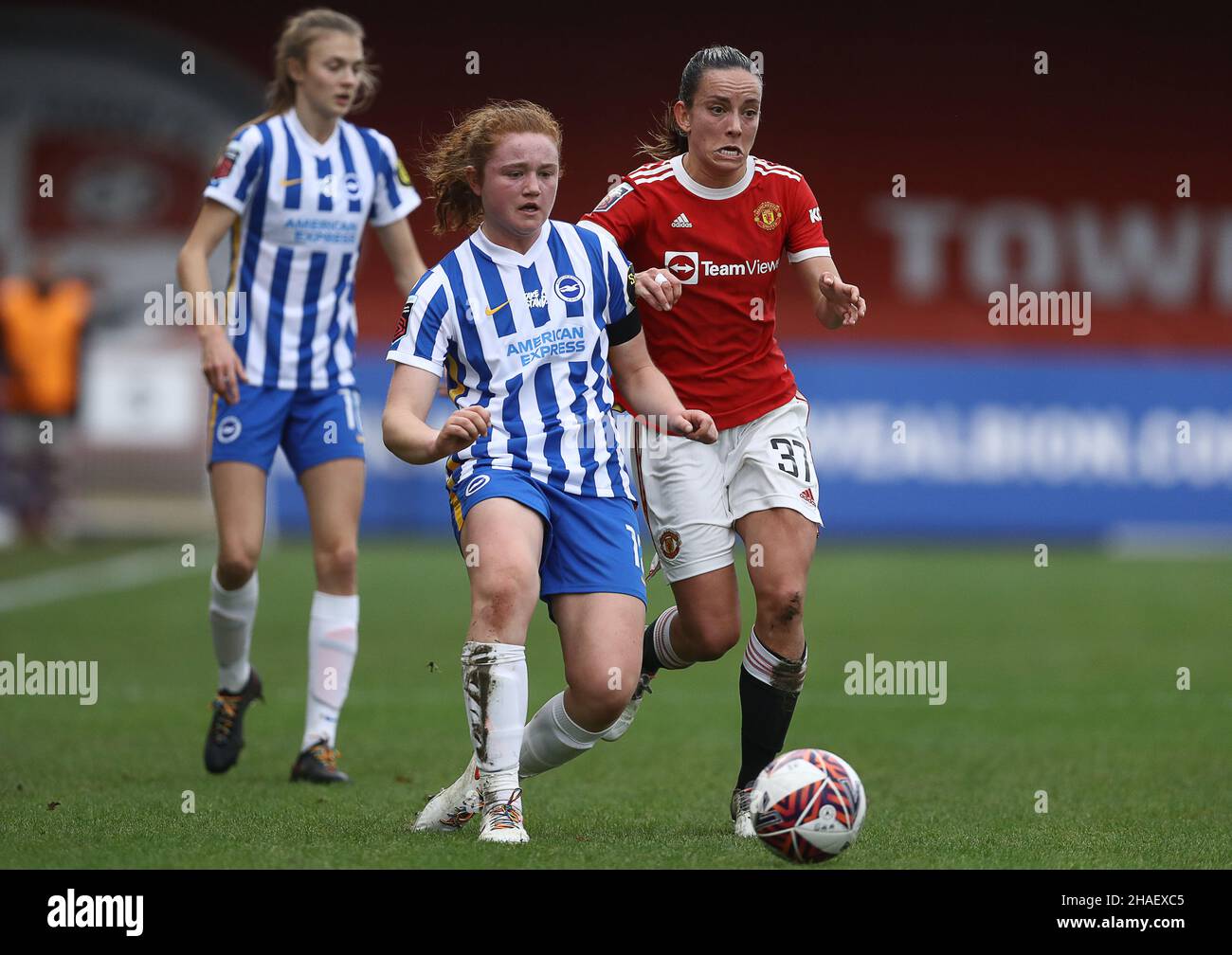 Crawley, UK, 12th December 2021. Libby Bance of Brighton and Hove Albion and Lucy Staniforth of Manchester United challenge for the ball during the The FA Women's Super League match at The People's Pension Stadium, Crawley. Picture credit should read: Paul Terry / Sportimage Credit: Sportimage/Alamy Live News Stock Photo