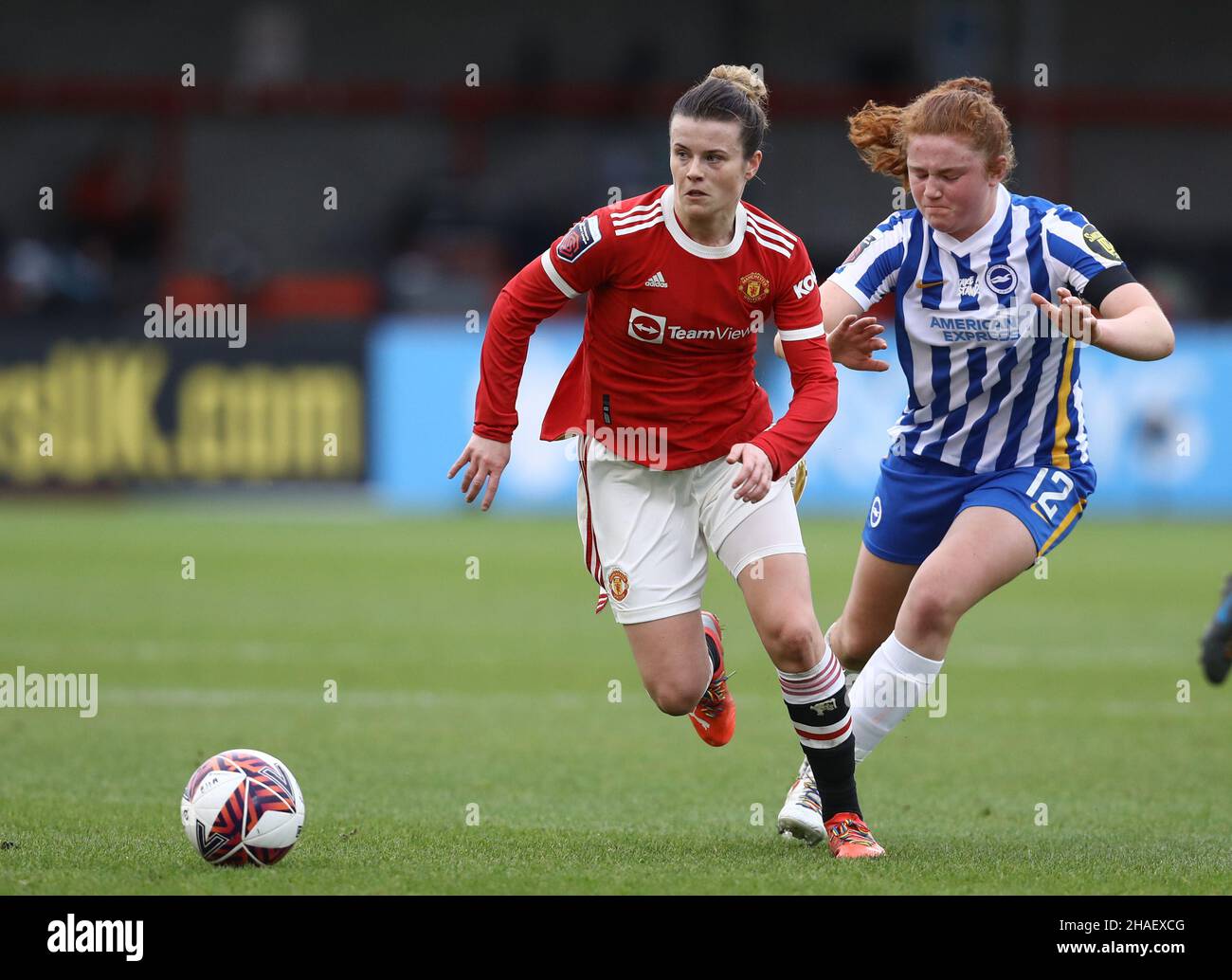 Crawley, UK, 12th December 2021. Libby Bance of Brighton and Hove Albion and Hayley Ladd of Manchester United during the The FA Women's Super League match at The People's Pension Stadium, Crawley. Picture credit should read: Paul Terry / Sportimage Credit: Sportimage/Alamy Live News Stock Photo