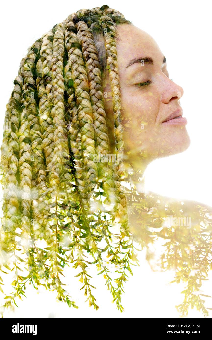 A portrait of a caucasian woman combined with an image of green leaves ...