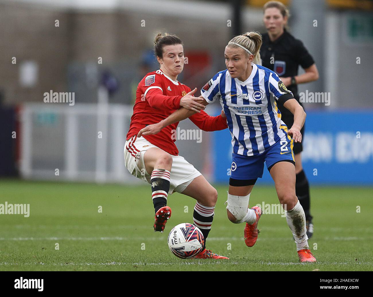 Crawley, UK, 12th December 2021. Emma Koivisto of Brighton and Hove Albion and Hayley Ladd of Manchester United challenge for the ball during the The FA Women's Super League match at The People's Pension Stadium, Crawley. Picture credit should read: Paul Terry / Sportimage Credit: Sportimage/Alamy Live News Stock Photo