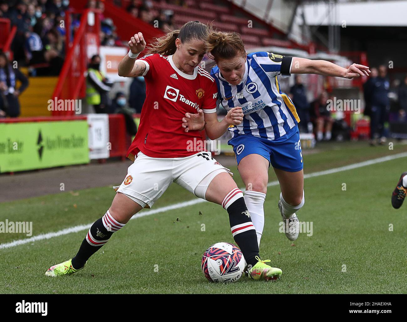 Crawley, UK, 12th December 2021. Ona Batlle of Manchester United is challenged by Felicity Gibbons of Brighton and Hove Albion during the The FA Women's Super League match at The People's Pension Stadium, Crawley. Picture credit should read: Paul Terry / Sportimage Credit: Sportimage/Alamy Live News Stock Photo