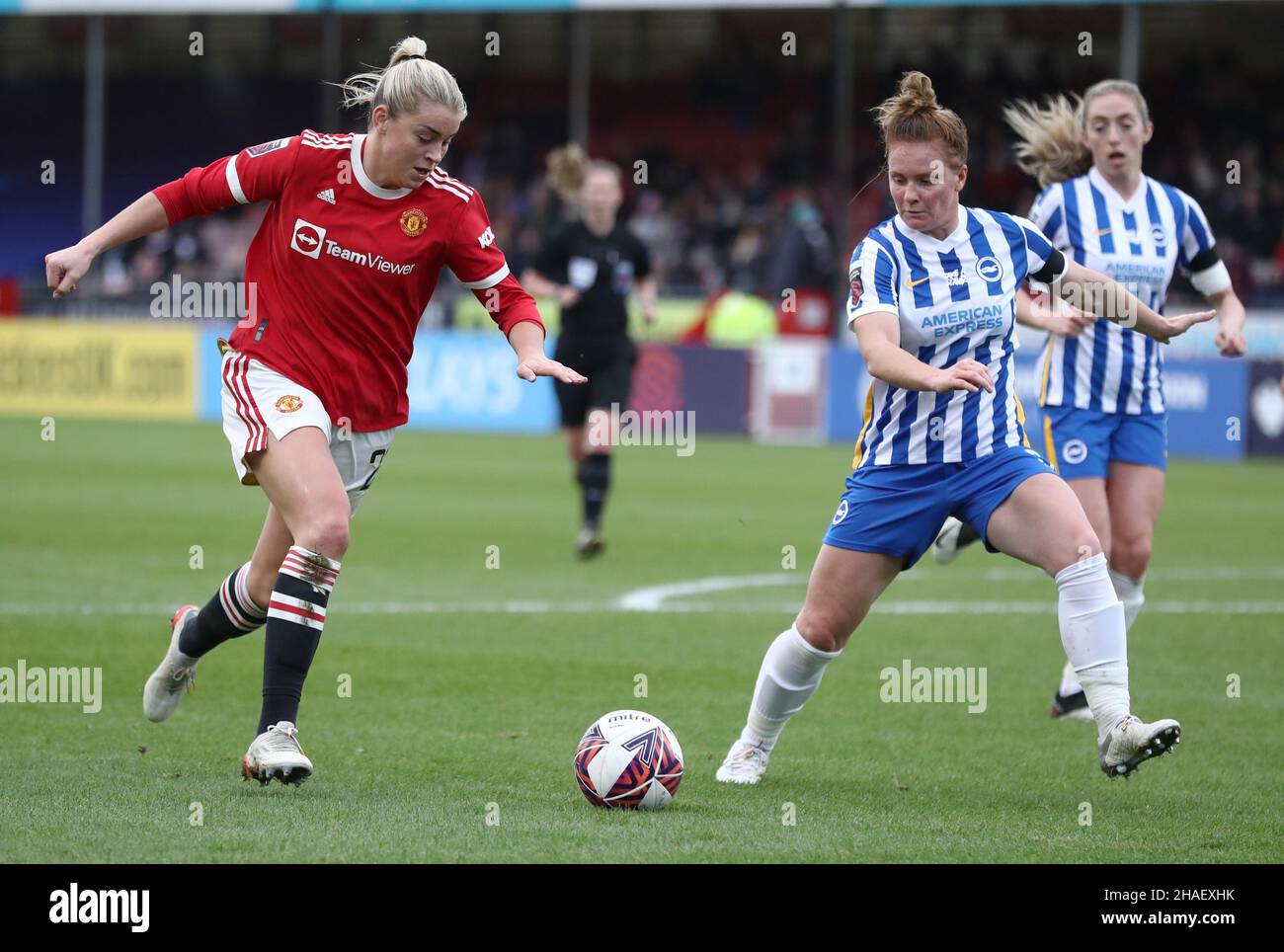 Crawley, UK, 12th December 2021. Alessia Russo of Manchester United is challenged by Libby Bance of Brighton and Hove Albion during the The FA Women's Super League match at The People's Pension Stadium, Crawley. Picture credit should read: Paul Terry / Sportimage Credit: Sportimage/Alamy Live News Stock Photo