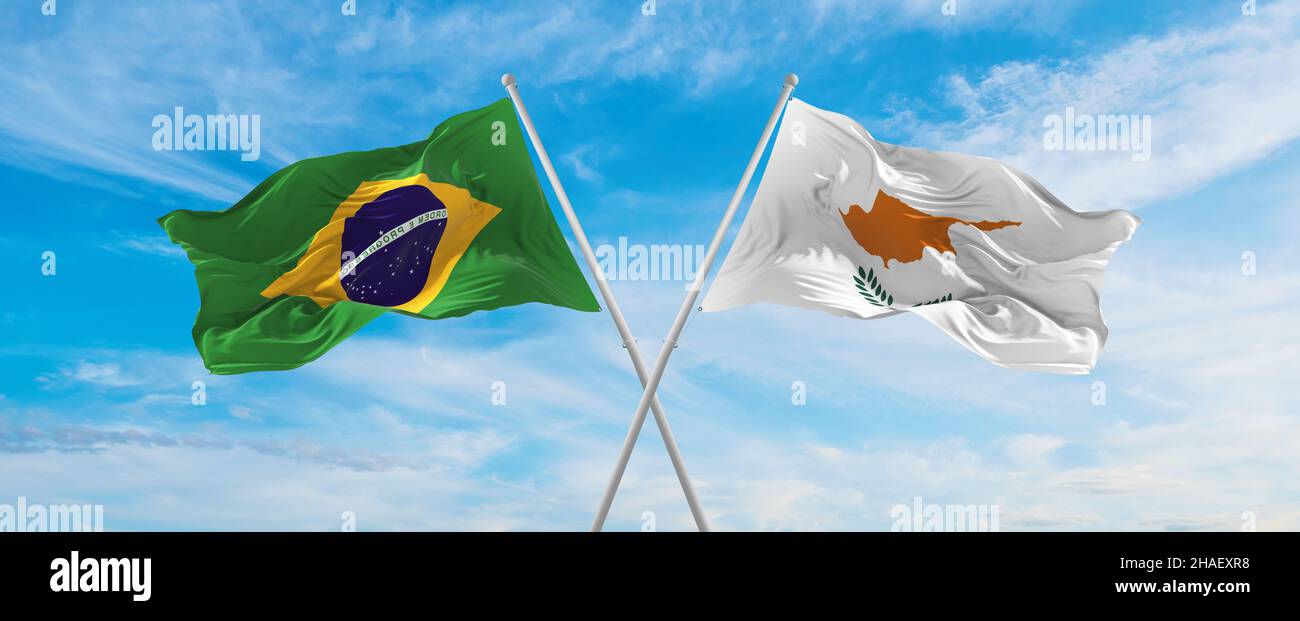 crossed national flags of Brazil and Cyprus flag waving in the wind at ...