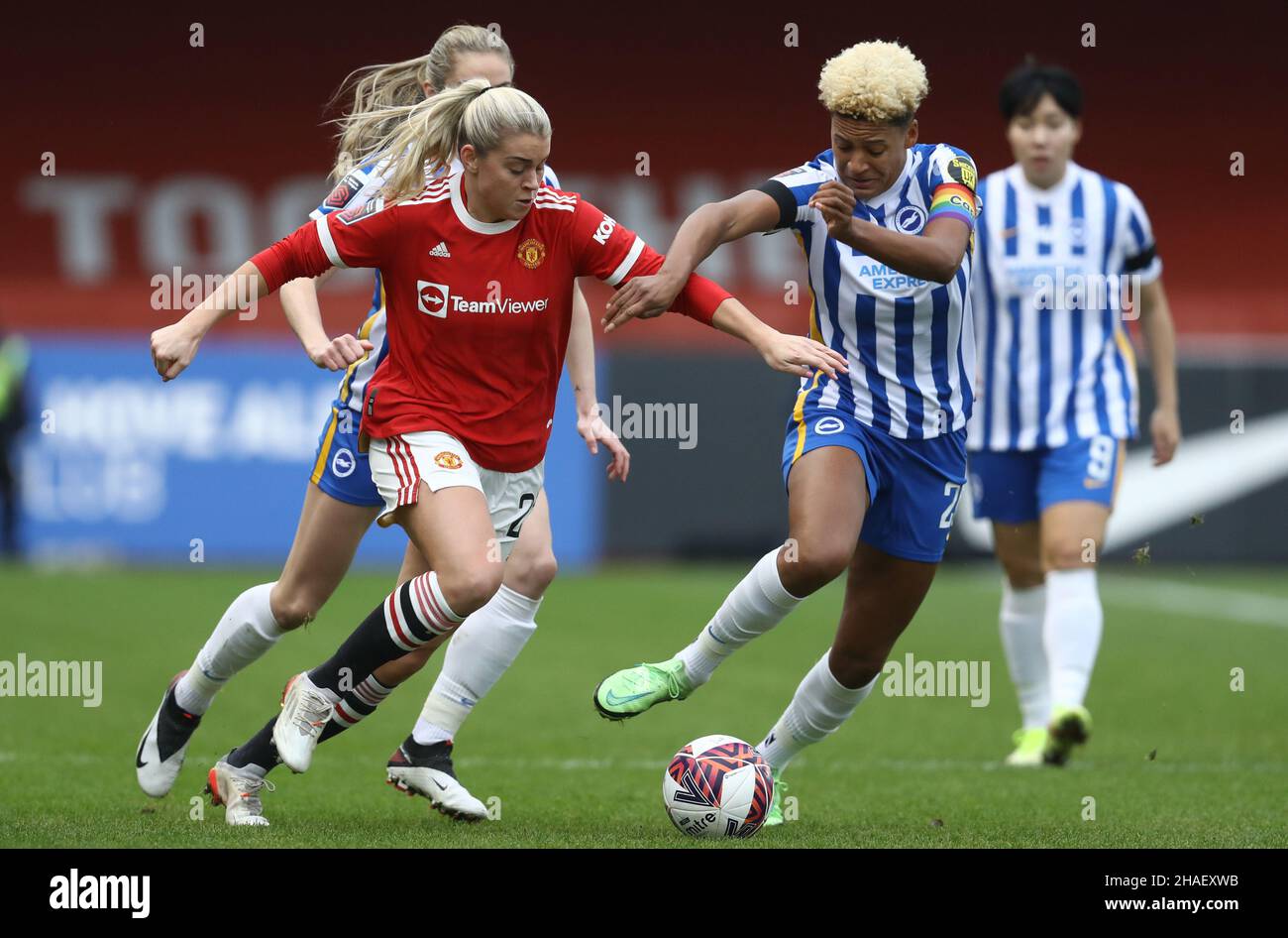 Crawley, UK, 12th December 2021. Victoria Williams of Brighton and Hove Albion and Alessia Russo of Manchester United challenge for the ball during the The FA Women's Super League match at The People's Pension Stadium, Crawley. Picture credit should read: Paul Terry / Sportimage Credit: Sportimage/Alamy Live News Stock Photo