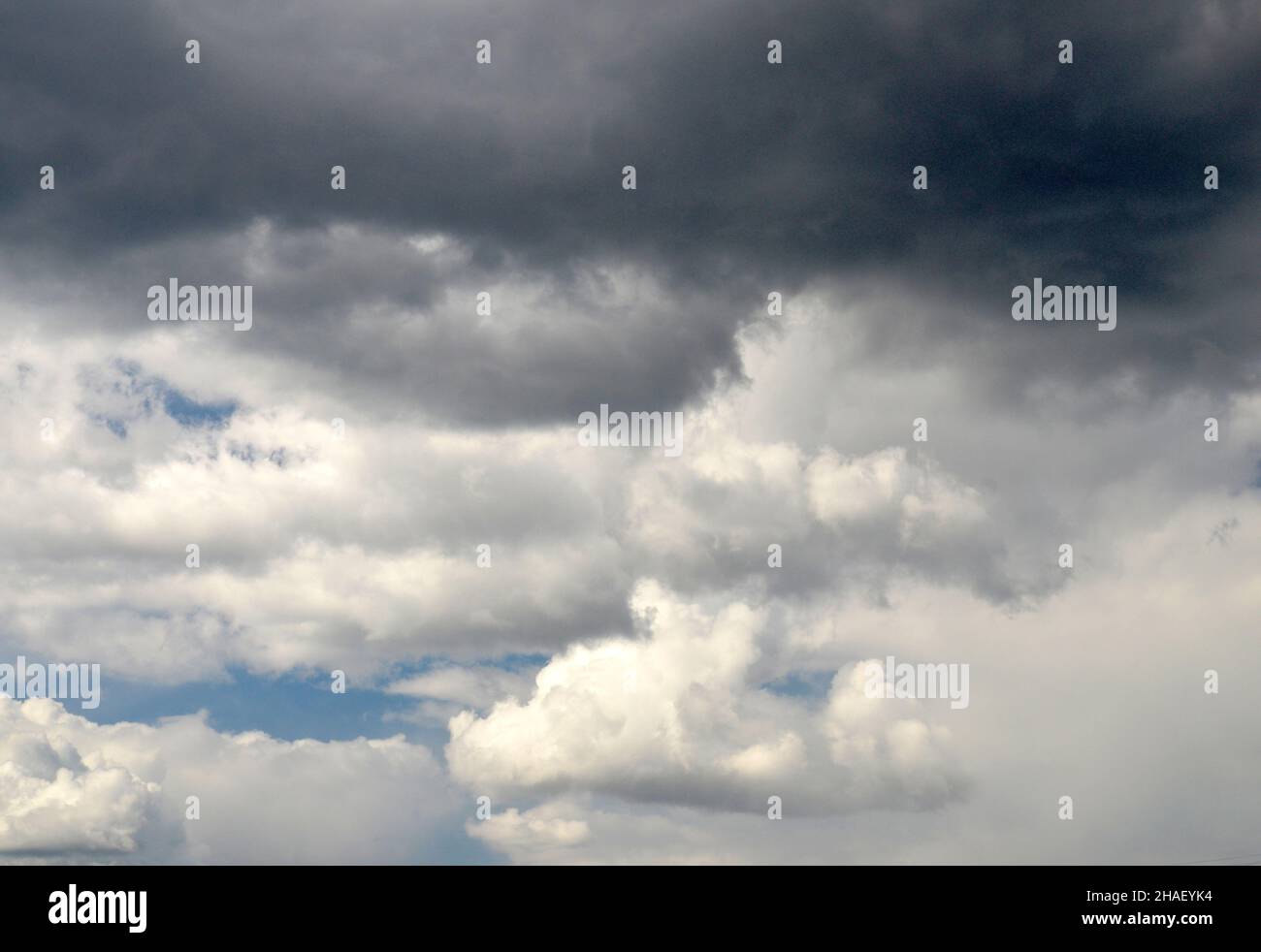 Dark stormy sky background, natural rain clouds wallpaper Stock Photo
