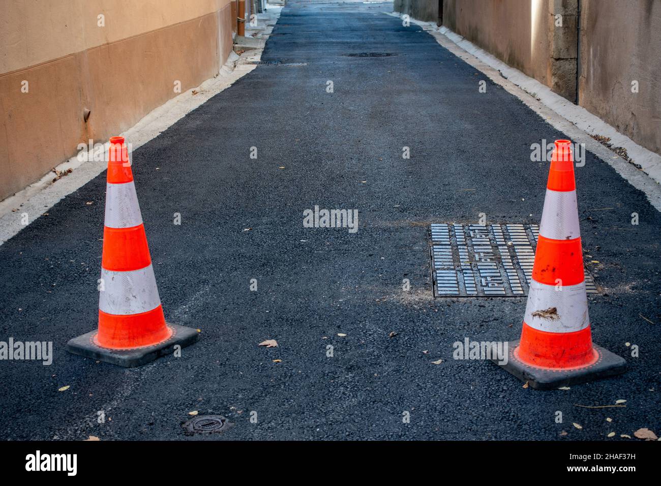 warning road cones marking blocked off road Stock Photo