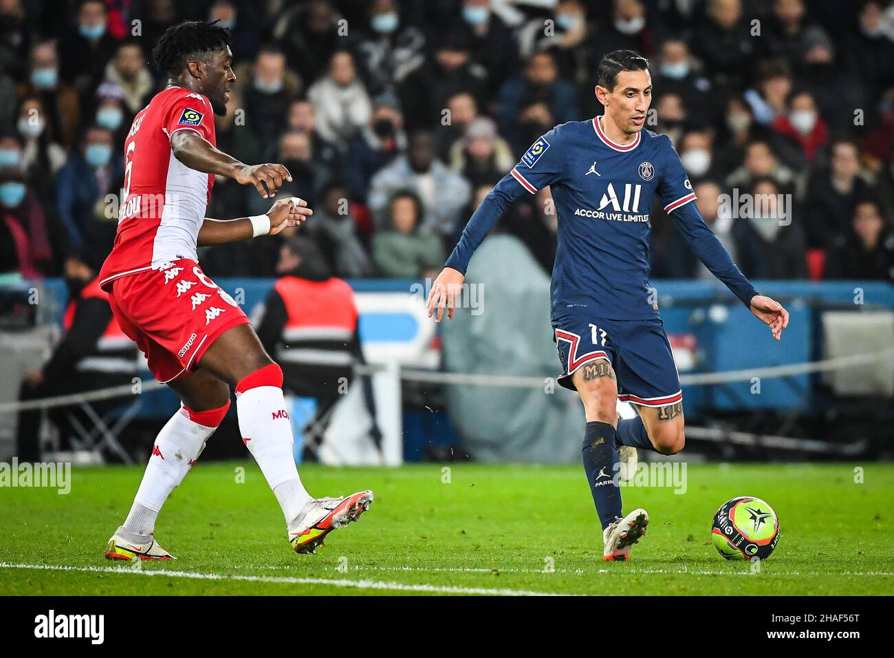 Axel DISASI of Monaco and Angel DI MARIA of PSG during the French championship Ligue 1 football match between Paris Saint-Germain and AS Monaco on December 12, 2021 at Parc des Princes stadium in Paris, France - Photo: Matthieu Mirville/DPPI/LiveMedia Stock Photo