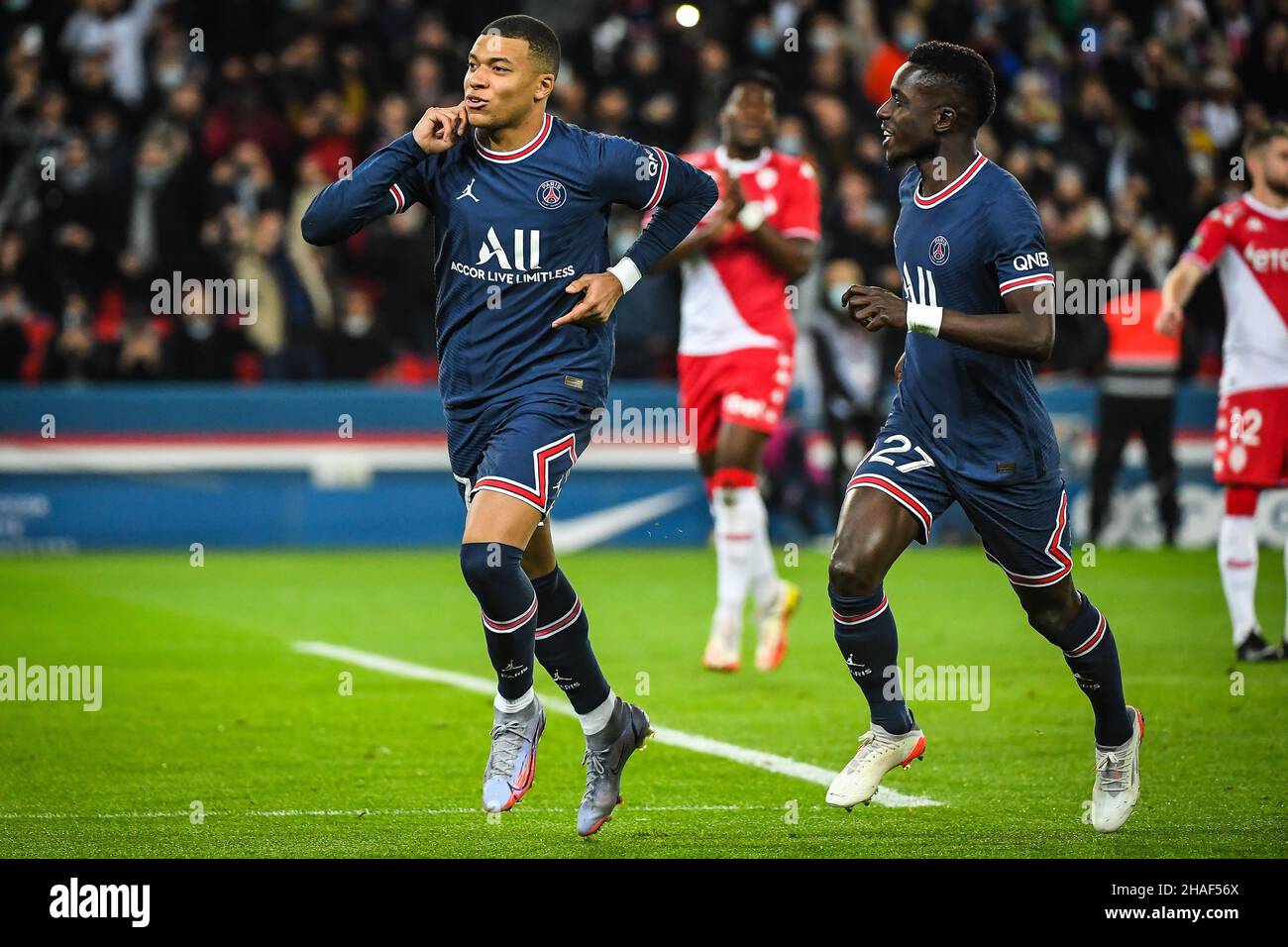 Kylian MBAPPE of PSG celebrate his goal with Idrissa GUEYE of PSG during the French championship Ligue 1 football match between Paris Saint-Germain and AS Monaco on December 12, 2021 at Parc des Princes stadium in Paris, France - Photo: Matthieu Mirville/DPPI/LiveMedia Stock Photo