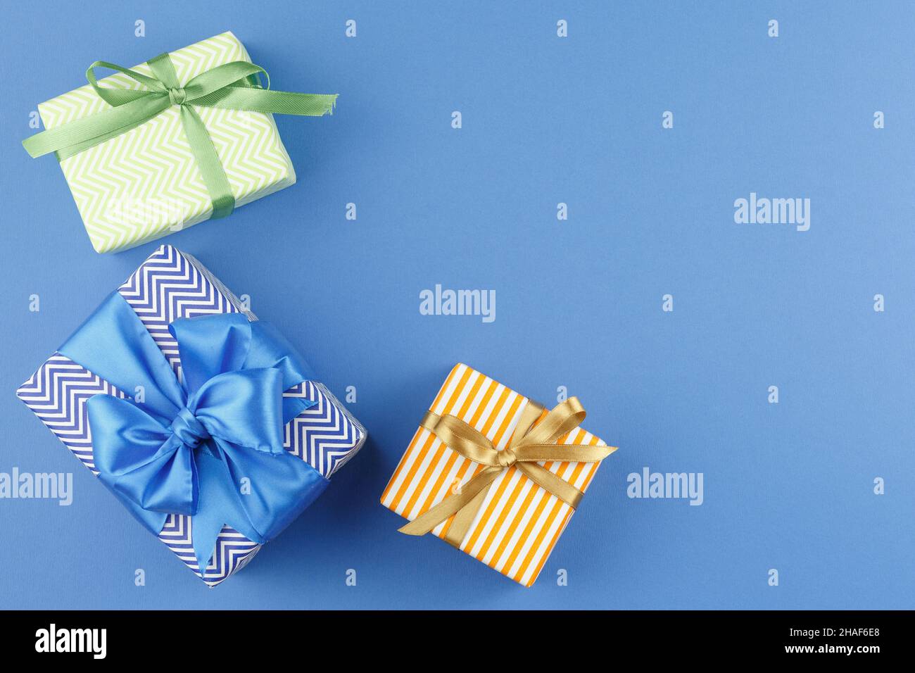 Present in gift paper on the table. Stock Photo