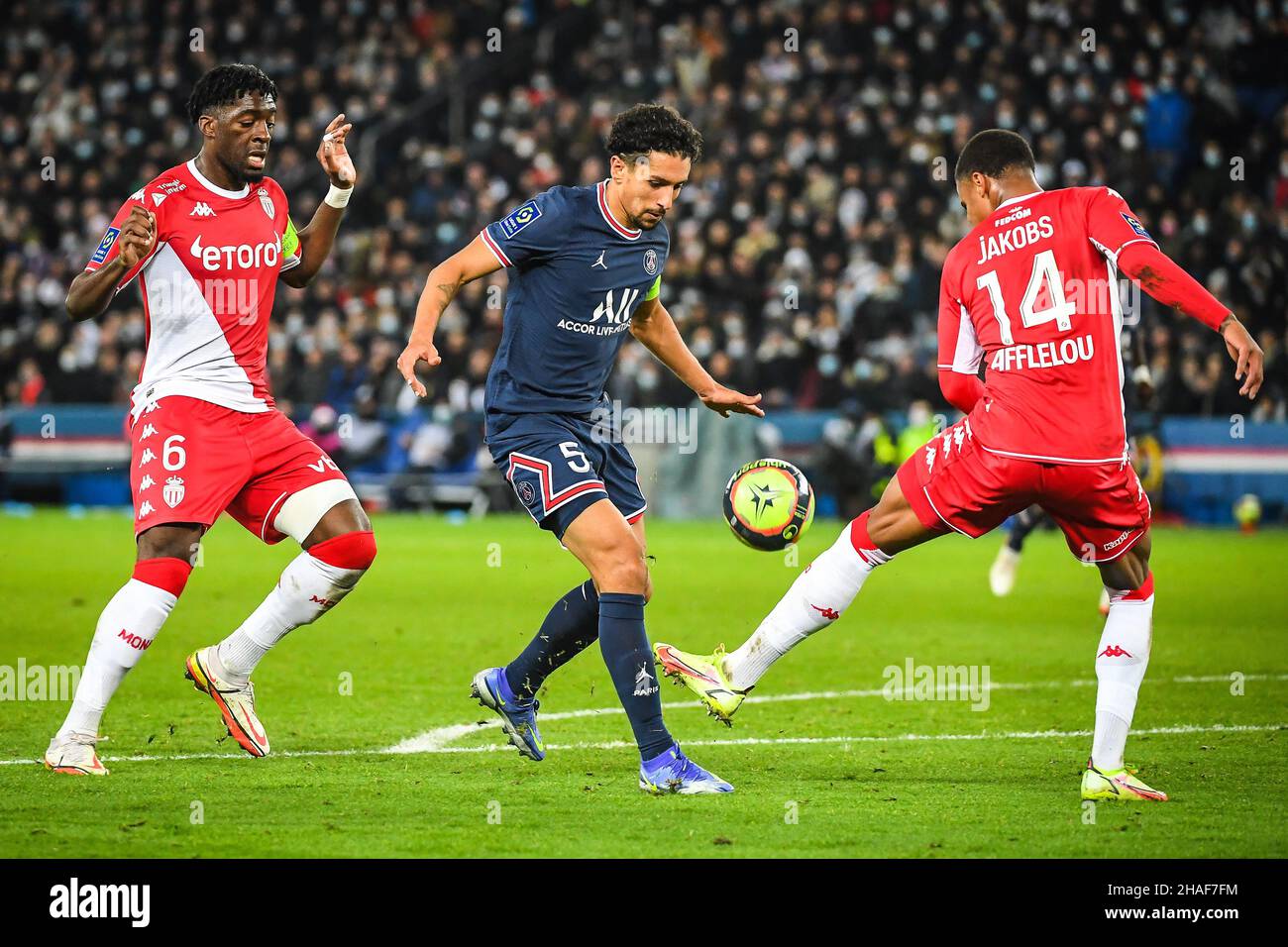 Axel DISASI of Monaco and MARQUINHOS of PSG during the French championship Ligue 1 football match between Paris Saint-Germain and AS Monaco on December 12, 2021 at Parc des Princes stadium in Paris, France - Photo: Matthieu Mirville/DPPI/LiveMedia Stock Photo