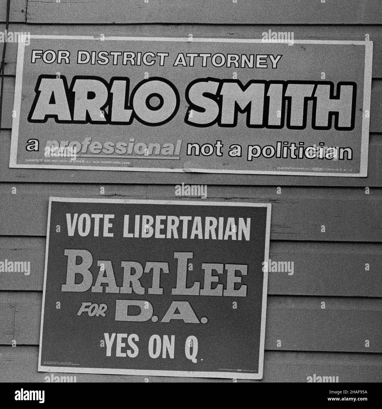 Vote Libertarian, Bart Lee for DA, yes on D, and for District Attorney Arlo Smith, a professional not a politician, campaign posters on a wall in San Francisco, California, 1970s Stock Photo