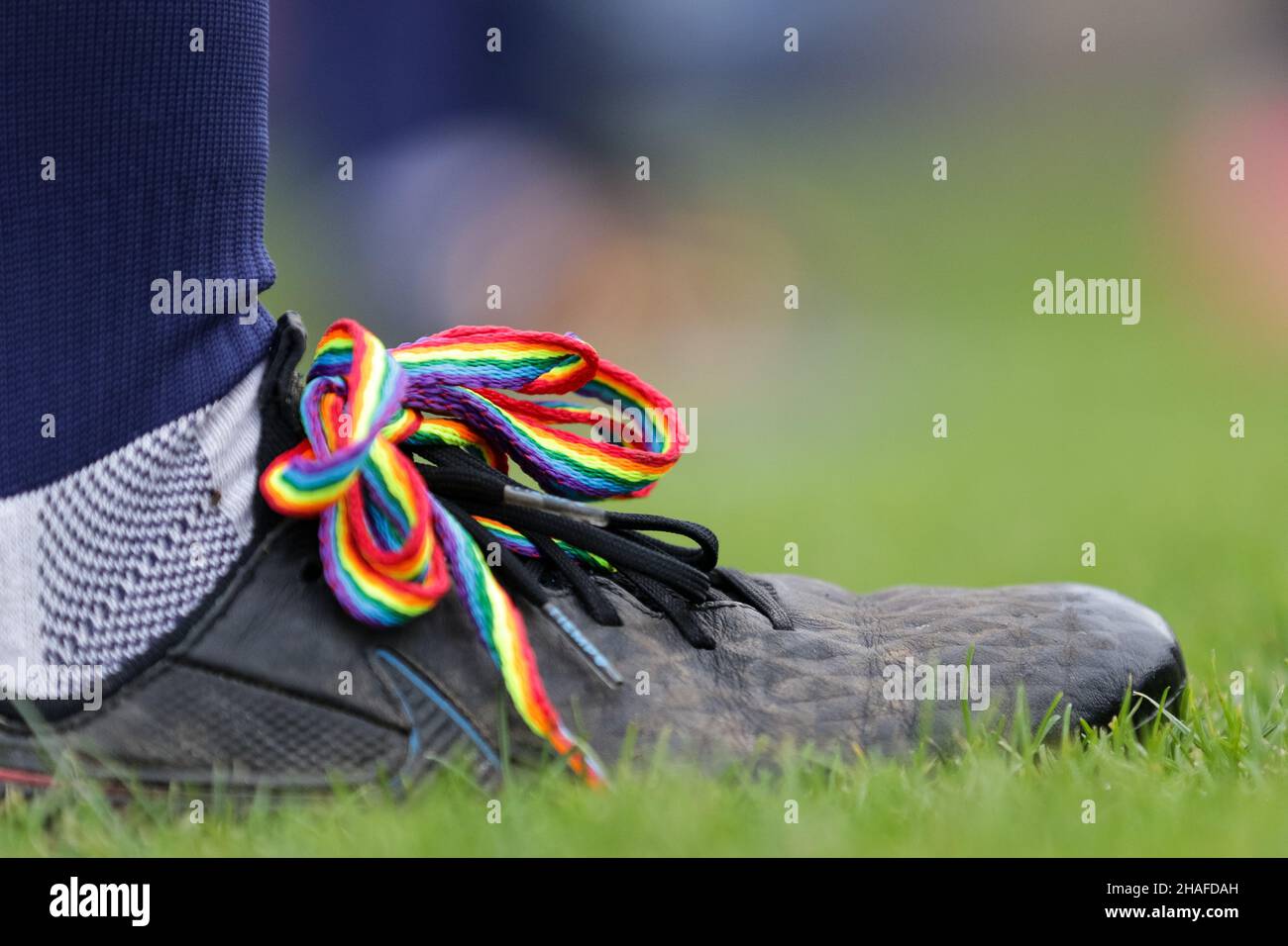 Rainbow laces tied on a football boot Stock Photo Alamy