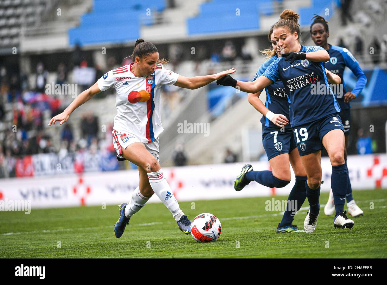 Paris, France. 12th Dec, 2021. Delphine Cascarino and Thea Greboval of Olympique Lyonnais during the Women's French championship, D1 Arkema football match between Paris FC and Olympique Lyonnais (OL) on December 12, 2021 at Charlety Stadium in Paris, France. Photo by Victor Joly/ABACAPRESS.COM Credit: Victor Joly/Alamy Live News Stock Photo